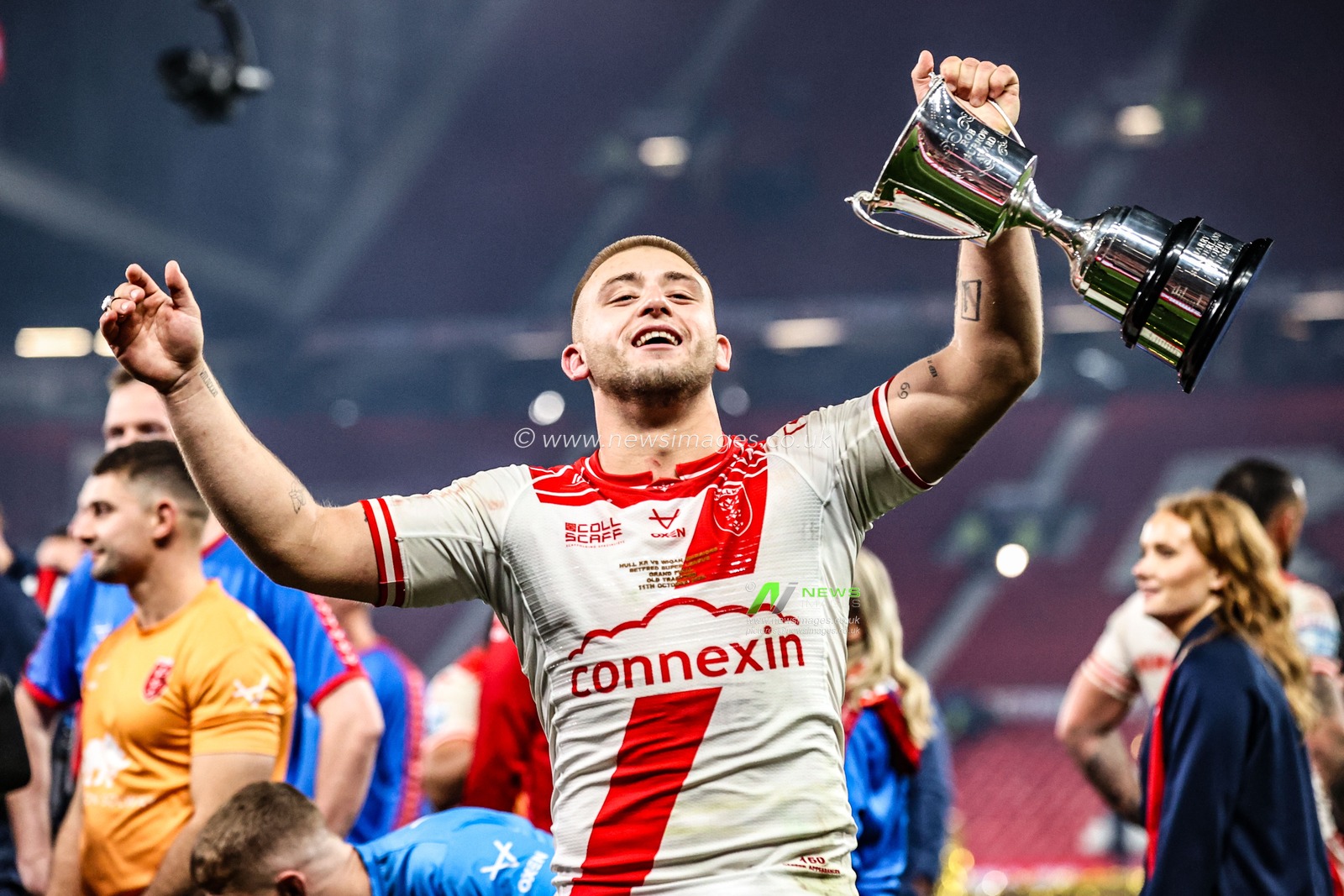 Man of the match Mikey Lewis of Hull KR celebrates with the fans after Hull KR win the Grand Final during the 2025 Betfred Super League Grand Final Hull KR v Wigan Warriors at Old Trafford, Manchester, United Kingdom, 11th October 2025

(Photo by Alfie Cosgrove/News Images)