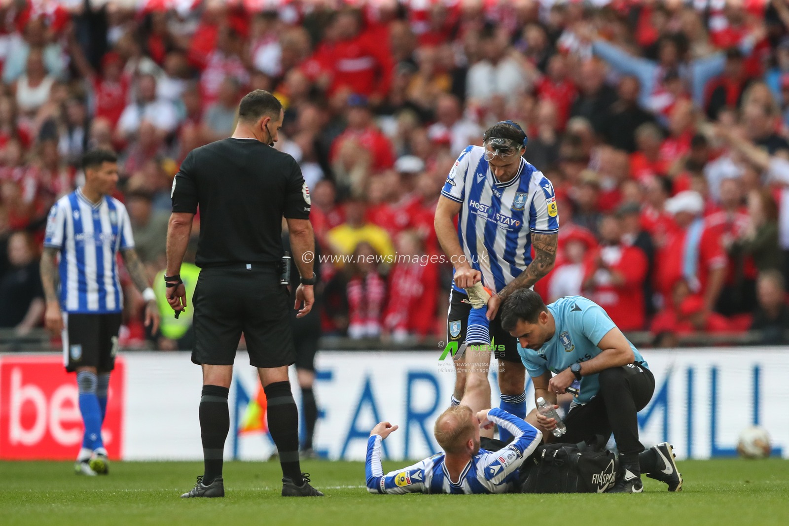 Barry Bannan #10 of Sheffield Wednesday receives treatment during the Sky Bet League 1 Play-off Final match Barnsley vs Sheffield Wednesday at Wembley Stadium, London, United Kingdom, 29th May 2023

(Photo by Gareth Evans/News Images)