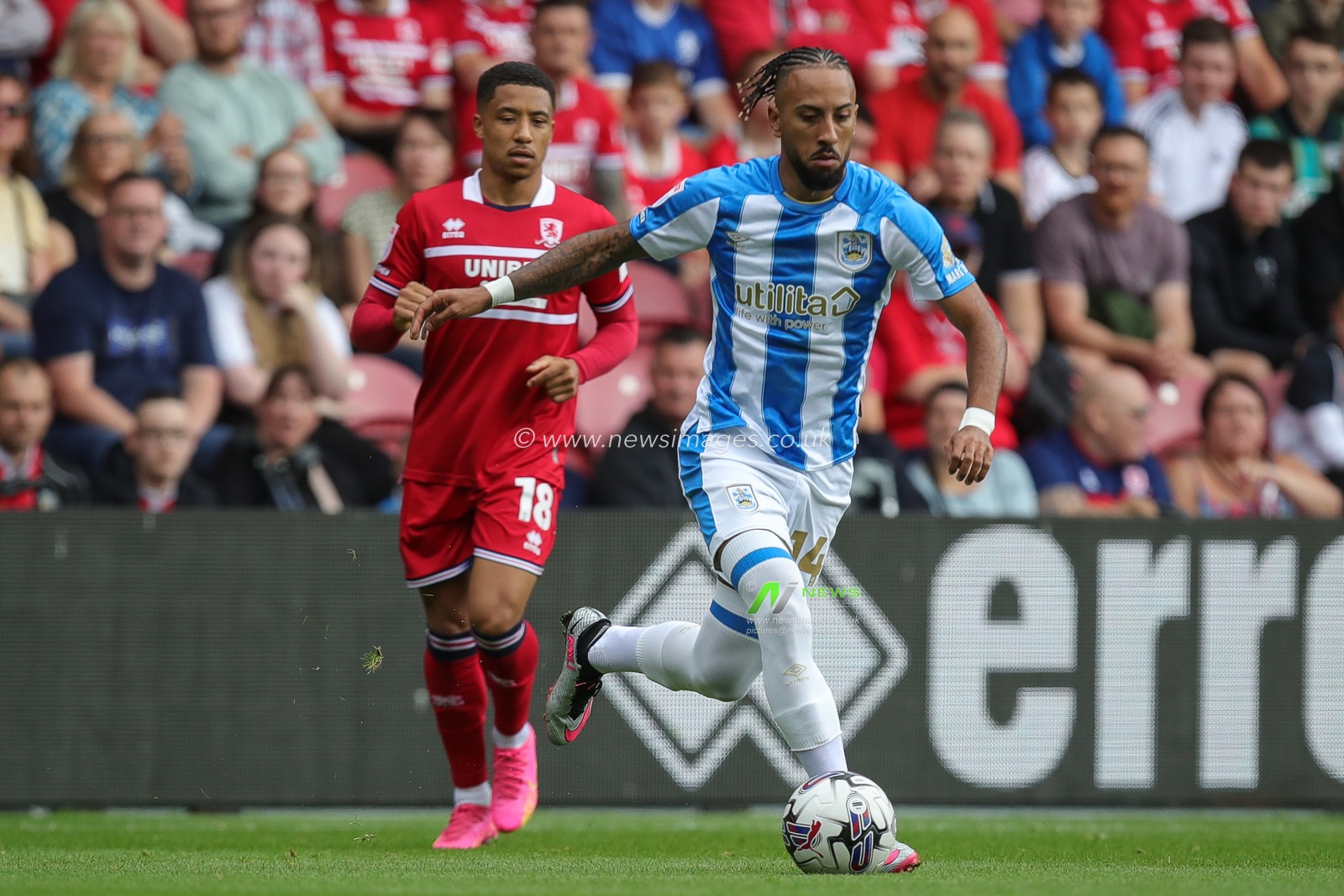 Sorba Thomas #14 of Huddersfield Town gets away from Samuel Silvera #18 of Middlesbrough during the Sky Bet Championship match Middlesbrough vs Huddersfield Town at Riverside Stadium, Middlesbrough, United Kingdom, 19th August 2023

(Photo by James Heaton/News Images)