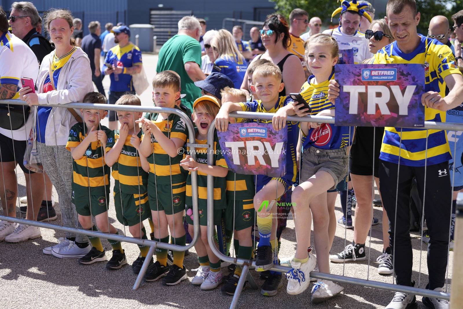 Young Warrington Wolves fans await their teams arrival before the Betfred Challenge Cup Semi-Final match Huddersfield Giants vs Warrington Wolves at Totally Wicked Stadium, St Helens, United Kingdom, 19th May 2024

(Photo by Steve Flynn/News Images)