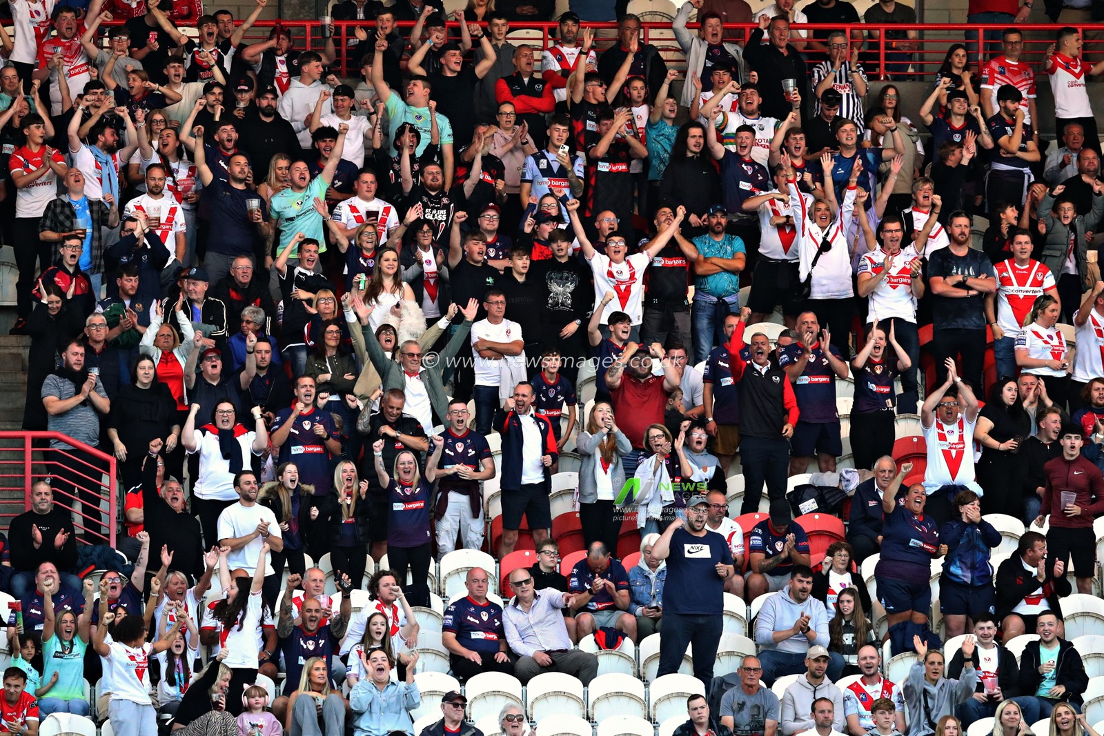 St. Helens fans celebrate the try scored by Lewis Murphy of St. Helens during the Betfred Super League Round 13 match Hull KR vs St Helens at Sewell Group Craven Park, Kingston upon Hull, United Kingdom, 30th May 2025(Photo by Sam Eaden/News Images)