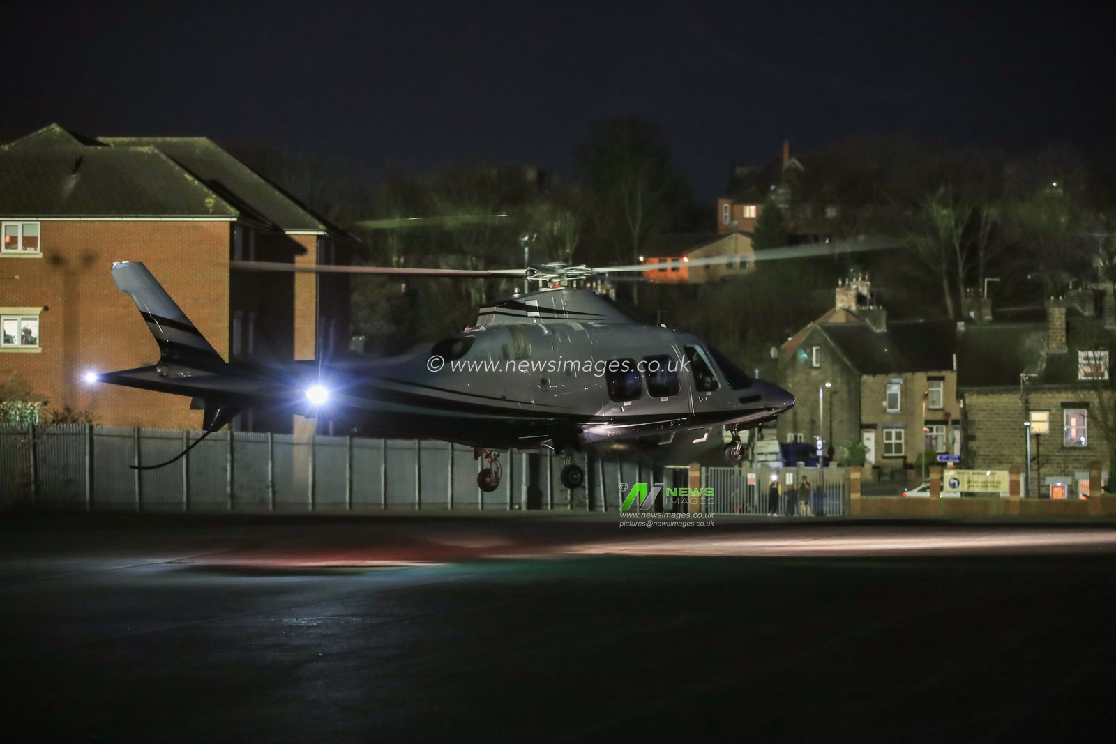 Peter Coates owner of Stoke City arrives at Oakwell by Helicopter