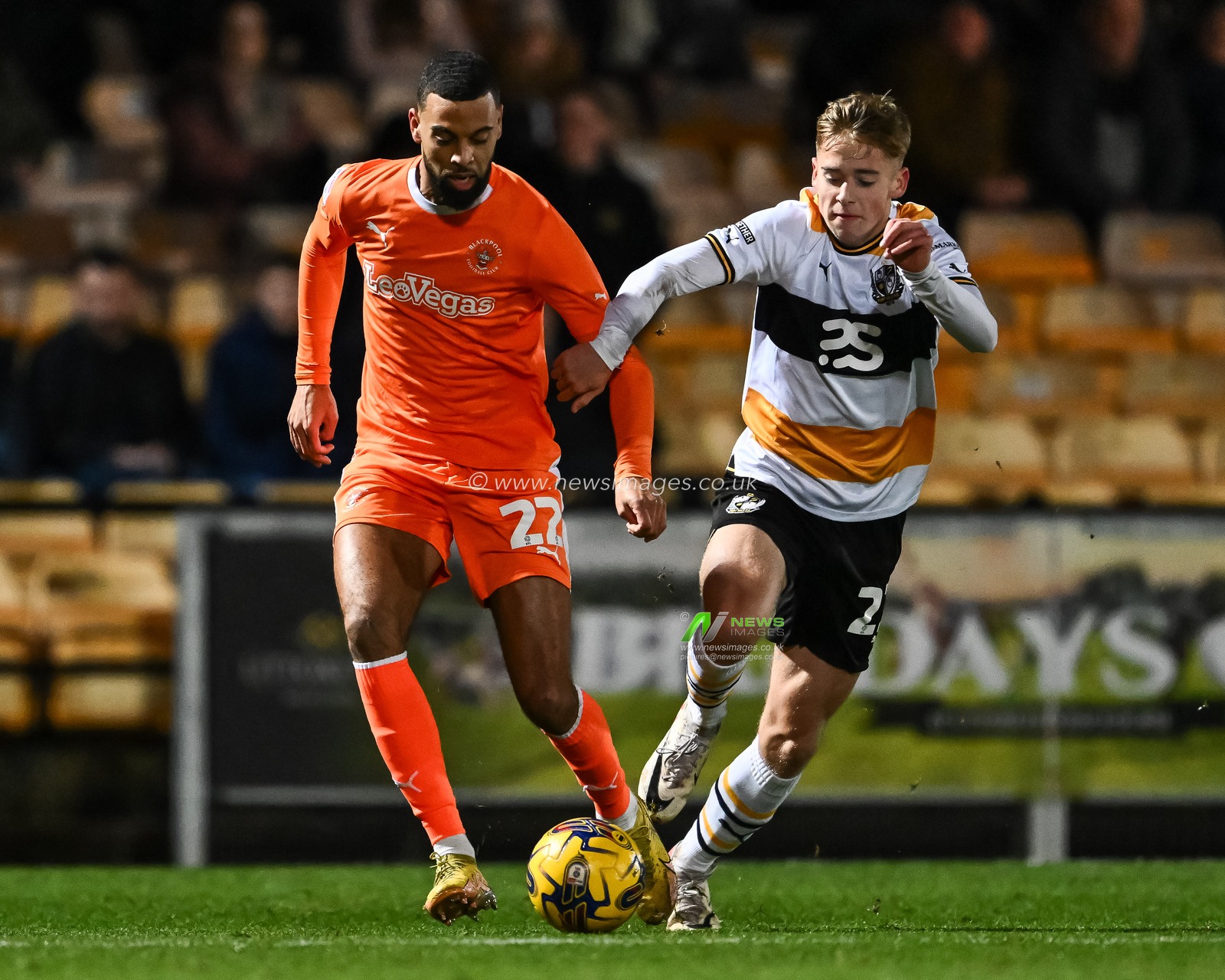 CJ Hamilton of Blackpool makes a break with the ball during the Sky Bet League 1 match Port Vale vs Blackpool at Vale Park, Burslem, United Kingdom, 29th December 2023

(Photo by Craig Thomas/News Images)