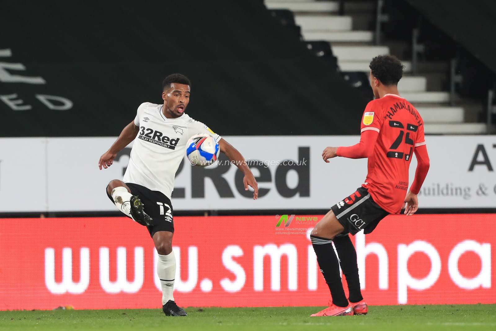 Nathan Byrne (12) of Derby County controls the ball
