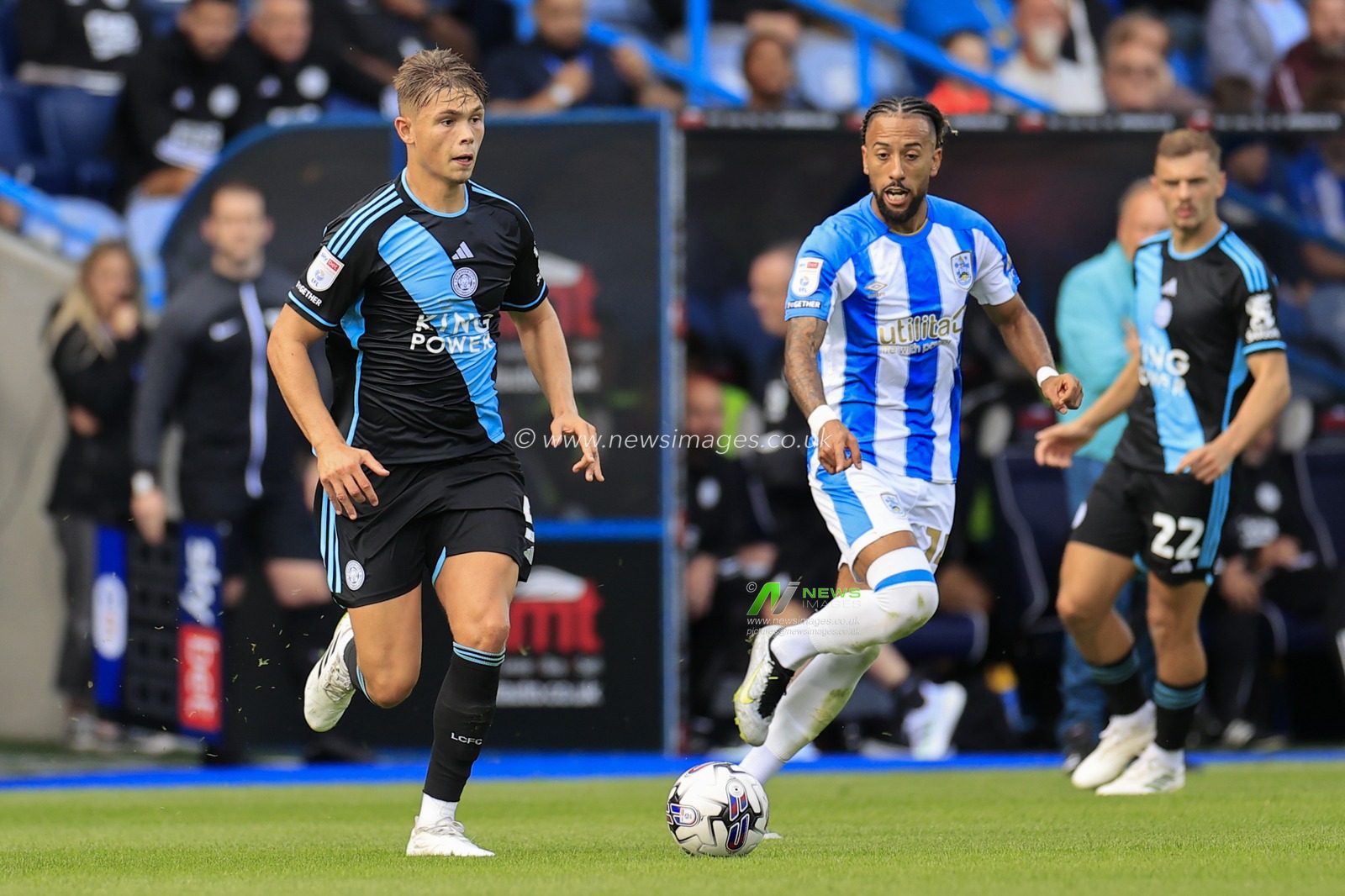 Callum Doyle #5 of Leicester City runs clear of Sorba Thomas #14 of Huddersfield Town during the Sky Bet Championship match Huddersfield Town vs Leicester City at John Smith's Stadium, Huddersfield, United Kingdom, 12th August 2023

(Photo by Conor Molloy/News Images)