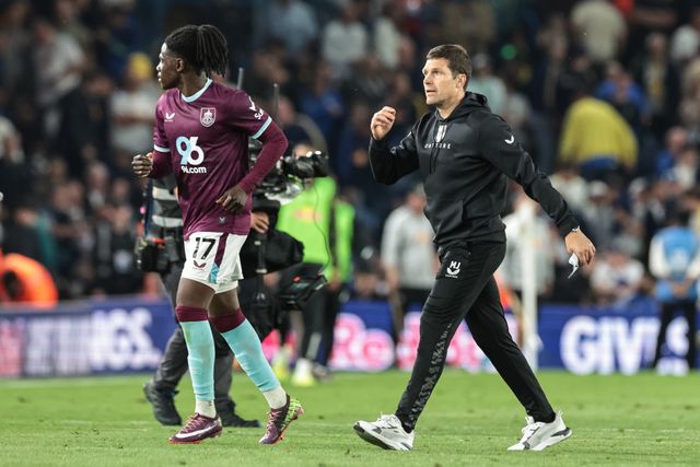 Mike Jackson caretaker manager of Burnley dashes onto the field of play as the halftime whistle blows to rush his players off during the Premier League match Leeds United vs Burnley at Elland Road, Leeds, United Kingdom on 01 May 2026

(Photo by Mark Cosgrove/News Images)