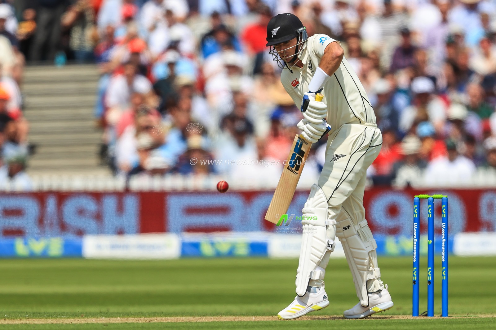 Tim Southee of New Zealand hits a four (4)