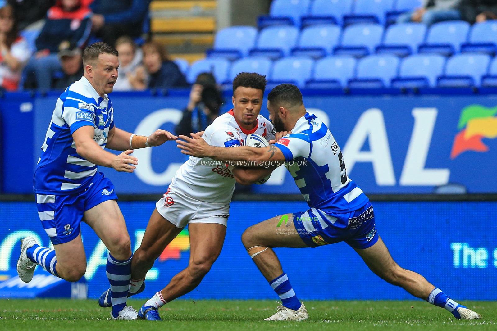 27th July 2019 , University of Bolton Stadium, Bolton, England; 2019 Coral Challenge Cup Semi-Final, St Helens vs Halifax RLFC ; Regan Grace (5) of St Helens tries to push past Will Sharp (5) of Halifax RLFC 


Credit: Mark Cosgrove/News Images