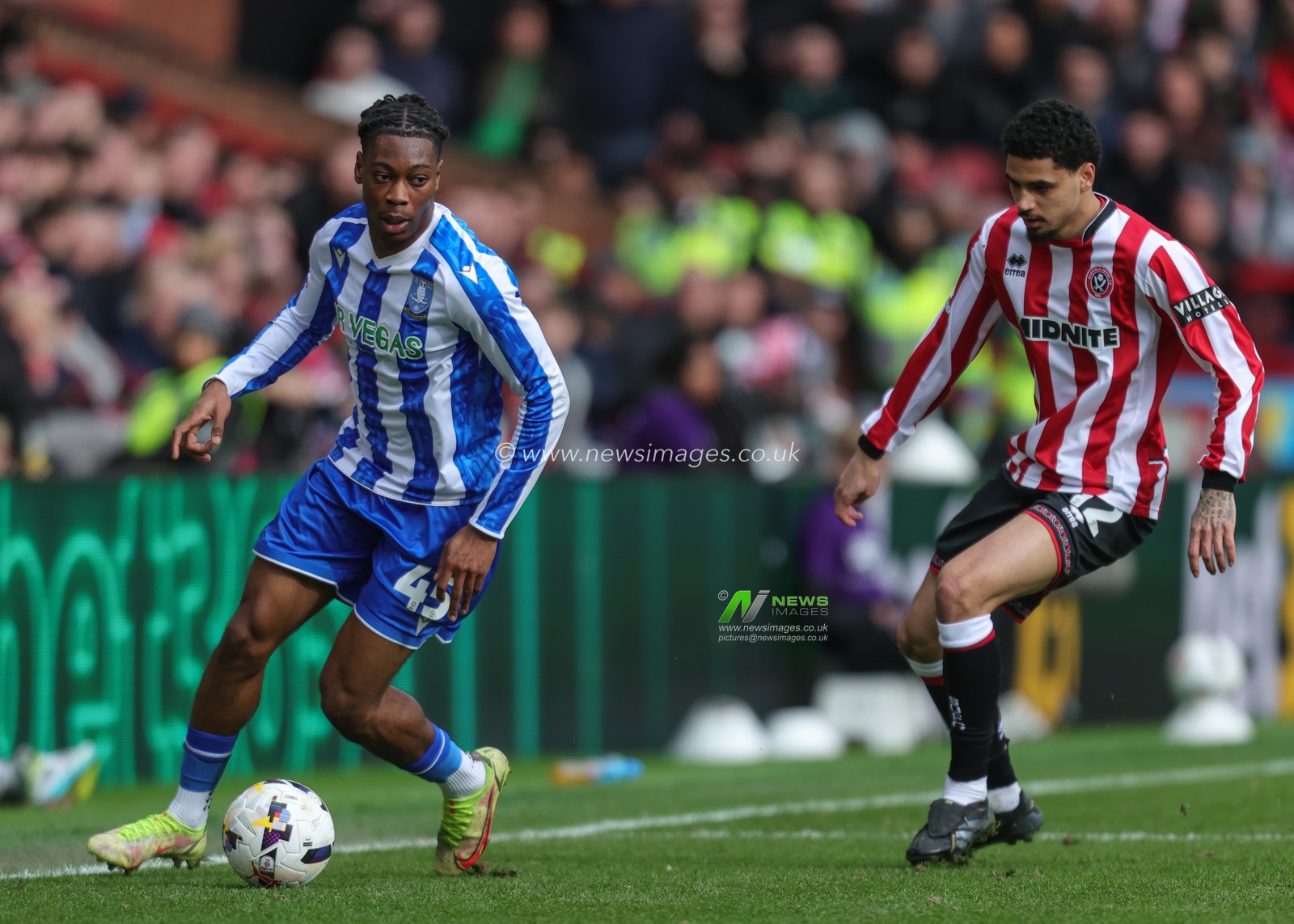 Tayo Adaramola of Sheffield Wednesday with the ball during the Sky Bet Championship match Sheffield United vs Sheffield Wednesday at Bramall Lane, Sheffield, United Kingdom on 22 February 2026

(Photo by Richard Bierton/News Images)