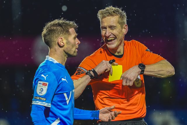 Referee Scott Oldham laughing with Stockport County Midfielder Oliver Norwood during the Sky Bet League 1 match Stockport County vs Exeter City at Edgeley Park Stadium, Stockport, United Kingdom, 7th December 2024

(Photo by James Giblin/News Images)
