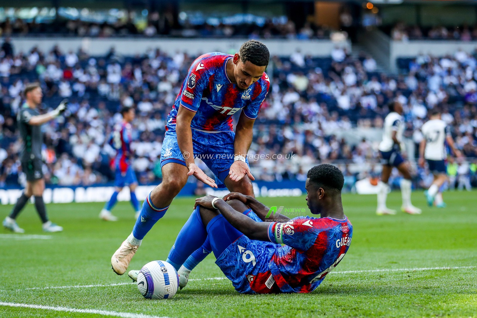 Maxence Lacroix helps Marc Guehi of Crystal Palace up during the Premier League match Tottenham Hotspur vs Crystal Palace at Tottenham Hotspur Stadium, London, United Kingdom, 11th May 2025

(Photo by Izzy Poles/News Images)