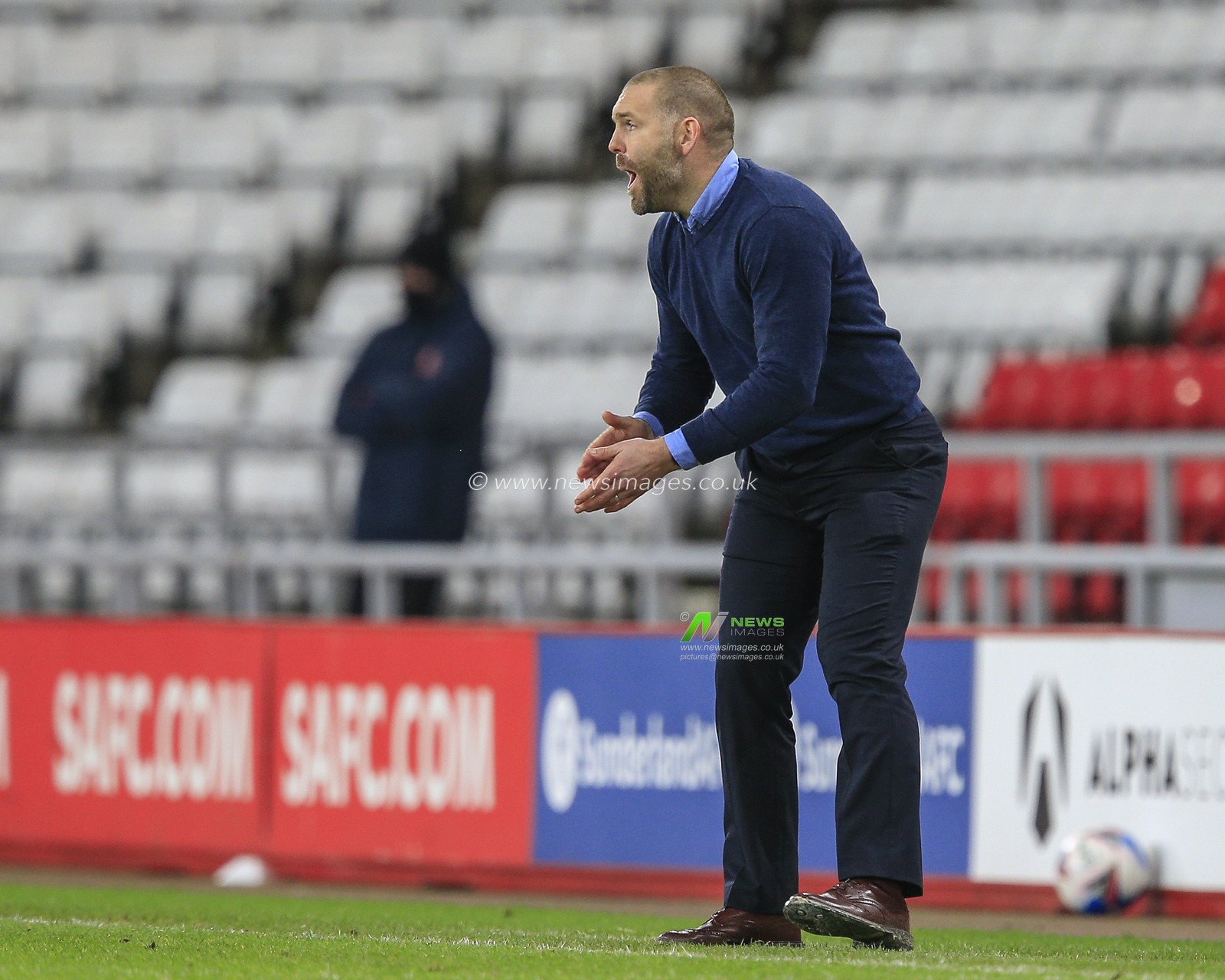 Jake Buxton, Manager of Burton Albion gives his team instructions
