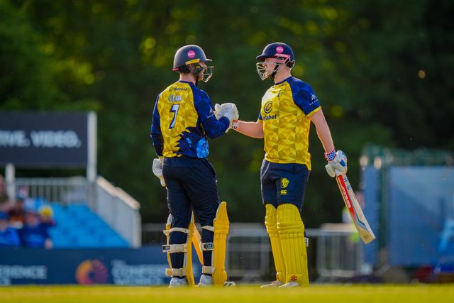 Alex Lees of Durham celebrates getting to 50 with Graham Clark of Durham by raising his bat towards the pavilion during the Vitality Blast T20 match between Derbyshire Falcons and Durham Cricket at The Central Co-Op County Ground, Derby, United Kingdom on 22 May 2026

(Photo by Maynard Manyowa/News Images)