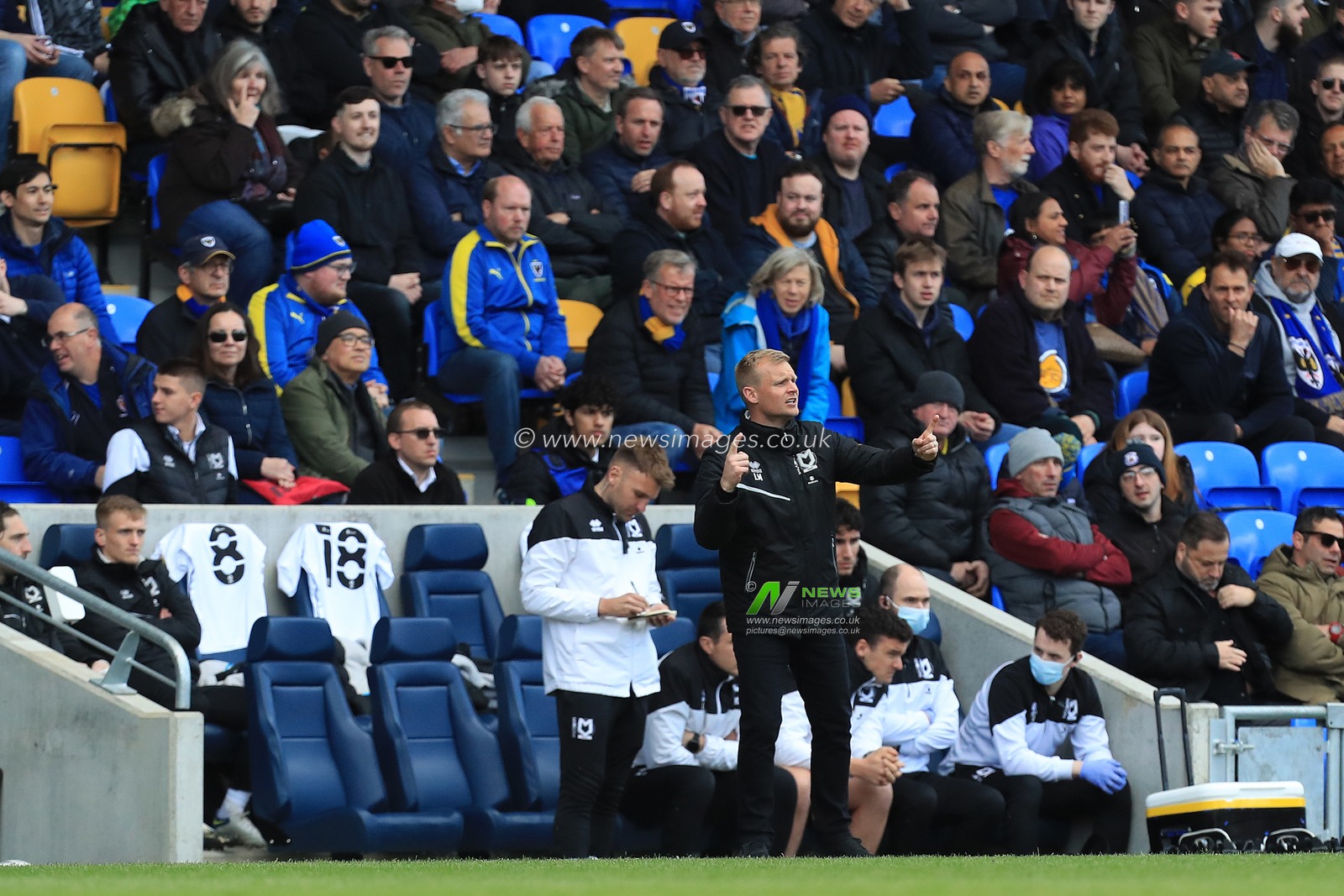 Liam Manning manager of Milton Keynes Dons seen during the match.