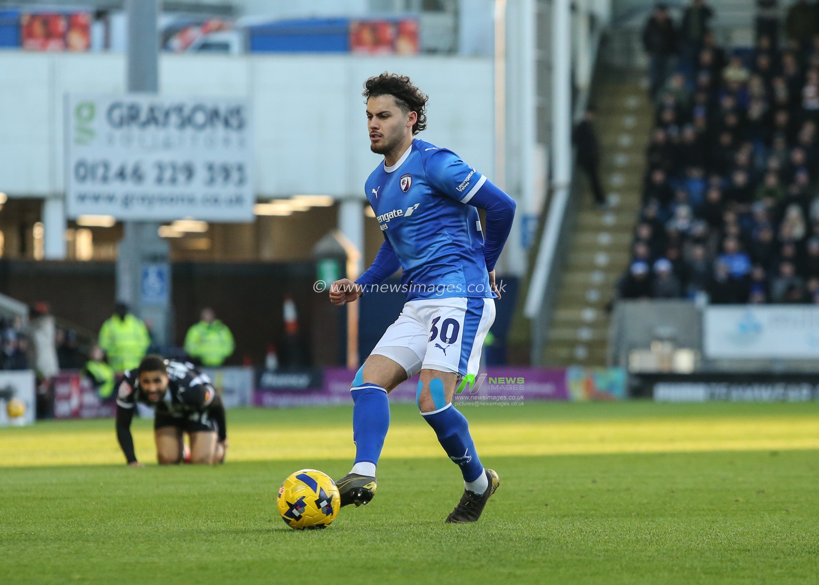 Lee Bonis of Chesterfield passes the ball during the Sky Bet League 2 match Chesterfield vs Notts County at SMH Group Stadium, Chesterfield, United Kingdom, 26th December 2025

(Photo by Richard Bierton/News Images)

*** GER AUT SUI OUT ***