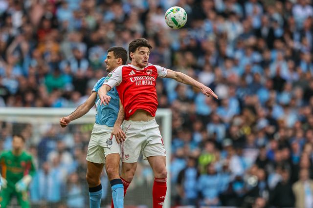Declan Rice of Arsenal battle for the ball in the air with Rodrigo of Manchester City during the Carabao Cup Final match Arsenal vs Manchester City at Emirates, London, United Kingdom on 22 March 2026

(Photo by Alfie Cosgrove/News Images)