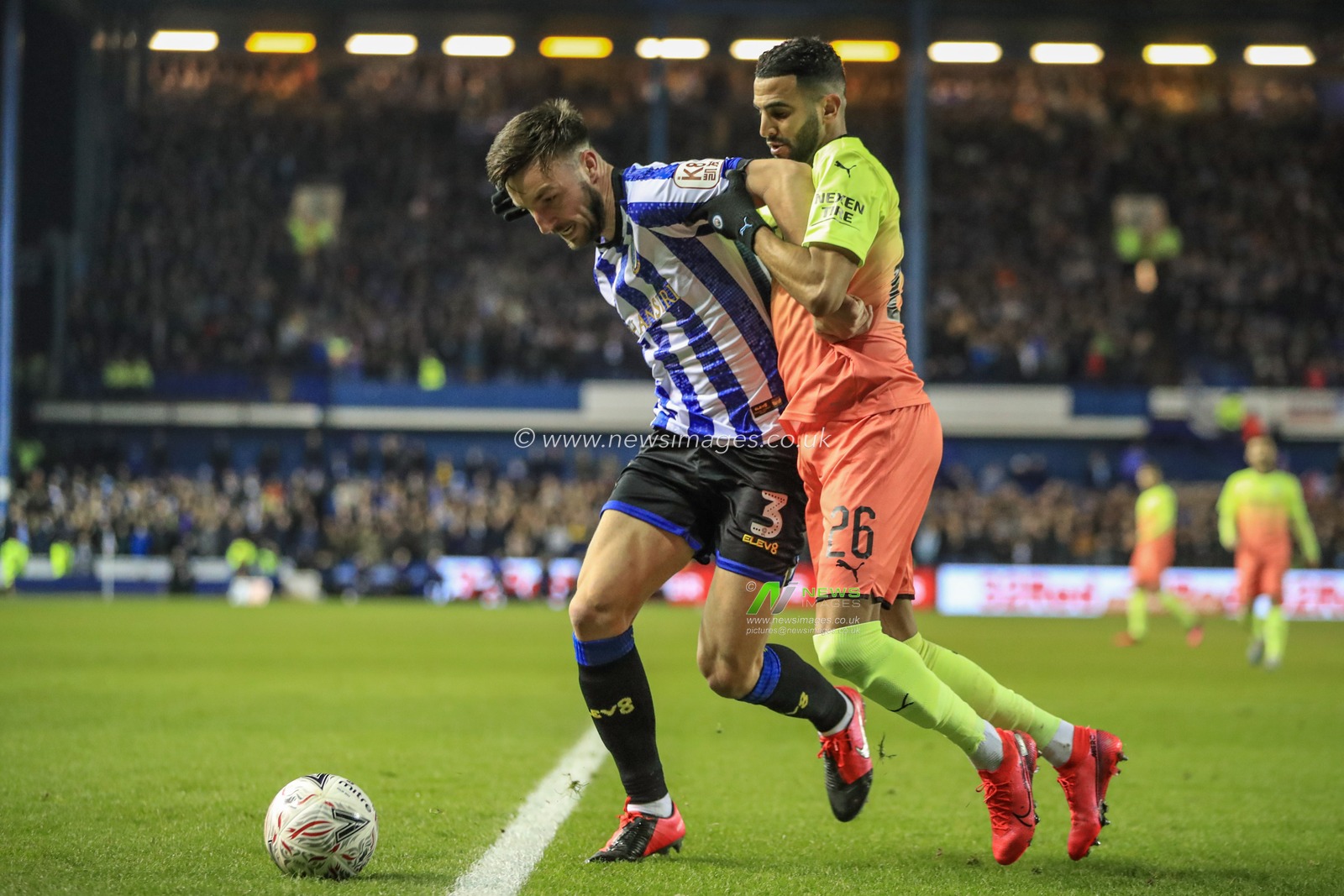 4th March 2020, Hillsborough, Sheffield, England; Emirates FA Cup FA Cup 5th Round, Sheffield Wednesday v Manchester City : Morgan Fox (3) of Sheffield Wednesday holds off Riyad Mahrez (26) of Manchester City