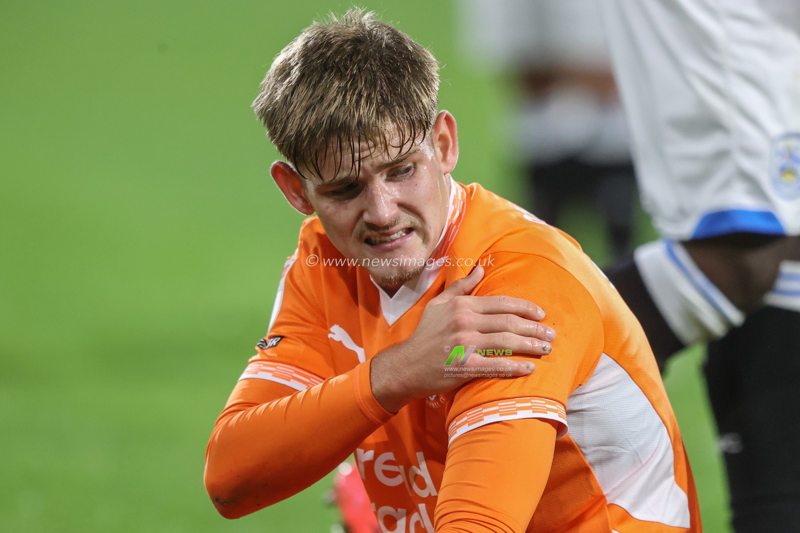 Dominic Ballard of Blackpool looks at his shoulder after colliding with Brodie Spencer of Huddersfield Town during the Sky Bet League 1 match Huddersfield Town vs Blackpool at John Smith's Stadium, Huddersfield, United Kingdom, 24th September 2024

(Photo by Alfie Cosgrove/News Images)