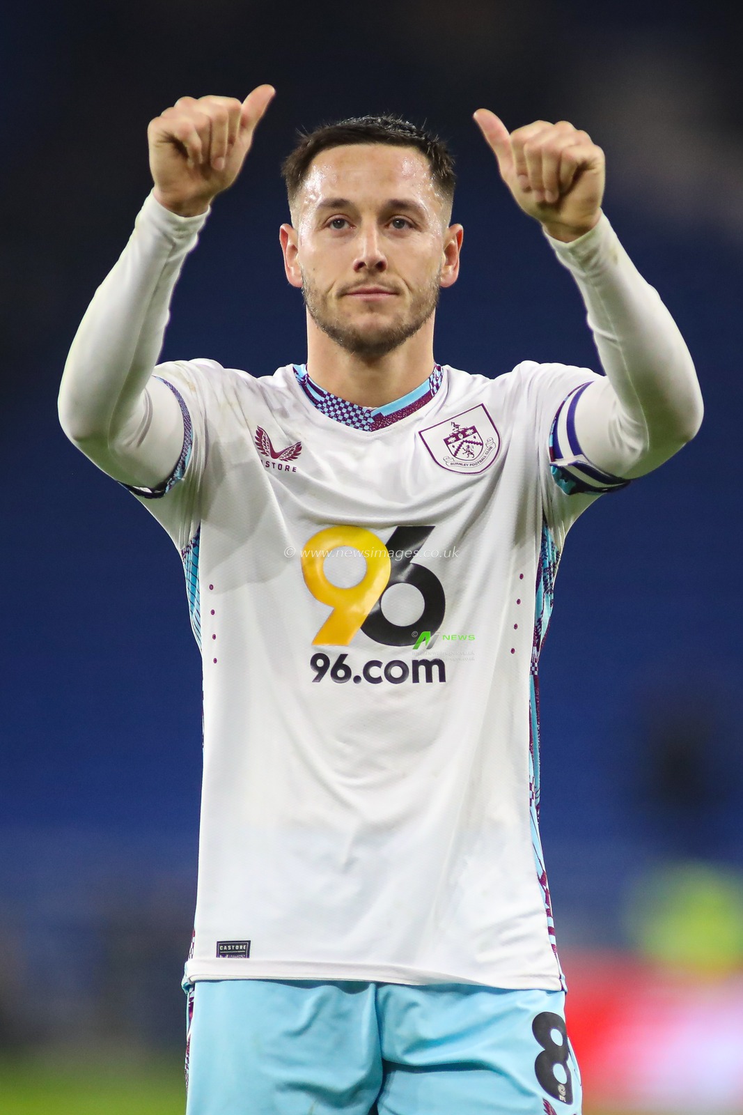 Josh Brownhill of Burnley celebrates with the Burnley fans at the final whistle during the Sky Bet Championship match Cardiff City vs Burnley at Cardiff City Stadium, Cardiff, United Kingdom, 4th March 2025

(Photo by Andrew Lewis/News Images)