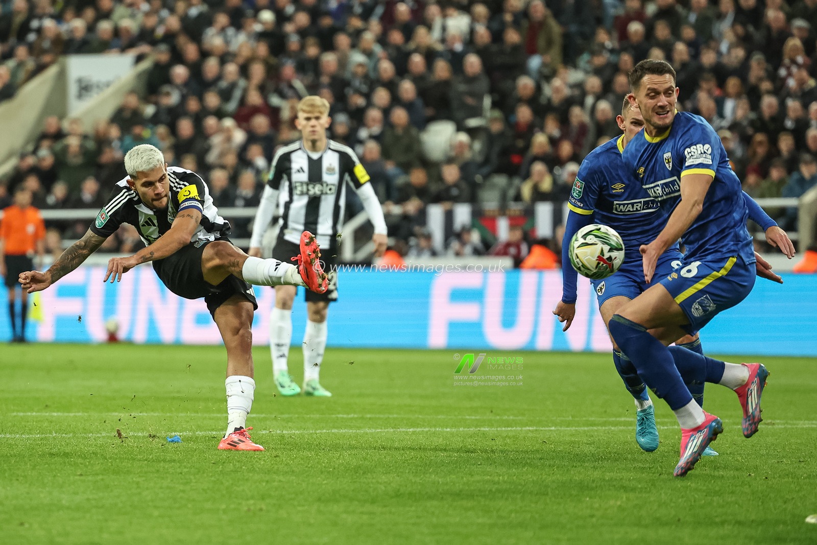 Bruno GuimarÃ£es of Newcastle United shoots on goal during the Carabao Cup 3rd Round Newcastle United vs AFC Wimbledon at St. James's Park, Newcastle, United Kingdom, 1st October 2024

(Photo by Mark Cosgrove/News Images)