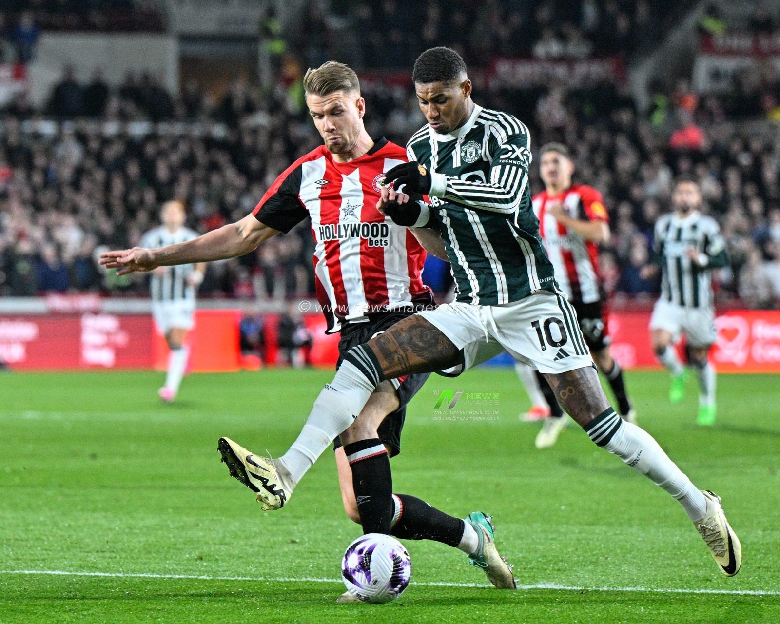 Marcus Rashford of Manchester United challenges the ball during the Premier League match Brentford vs Manchester United at The Gtech Community Stadium, London, United Kingdom, 30th March 2024

(Photo by Cody Froggatt/News Images)