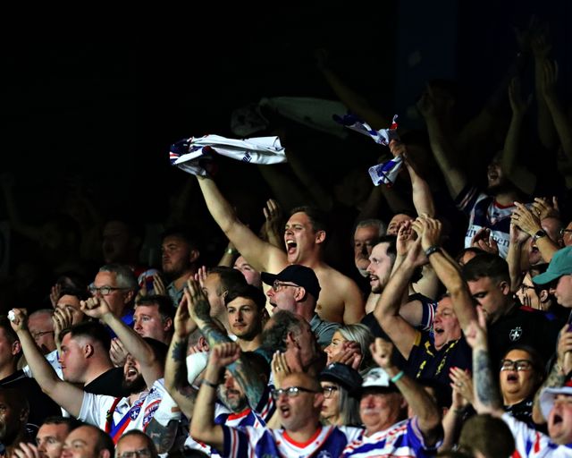 Wakefield fans celebrate after the Betfred Super League round 19 match Huddersfield Giants vs Wakefield Trinity at the Accu Stadium, Huddersfield, United Kingdom, 18th July 2025

(Photo by Sam Eaden/News Images)