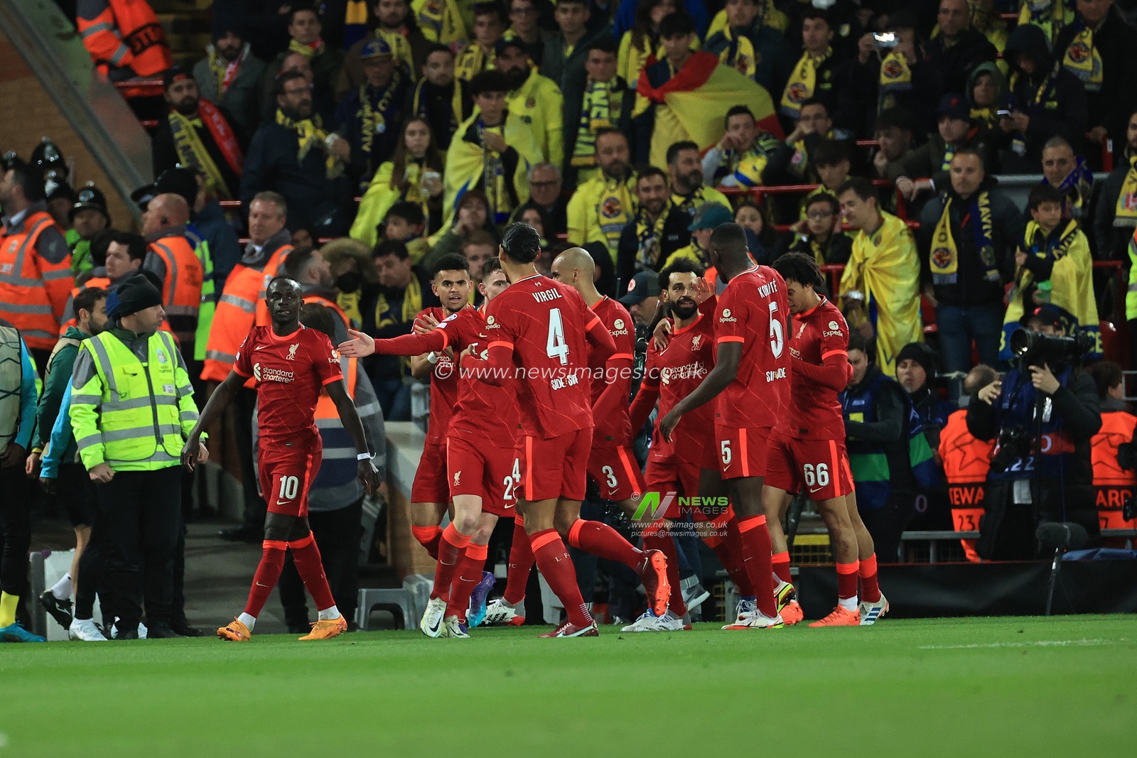 Sadio Mane #10 of Liverpool celebrates scoring his side's second goal with team mates