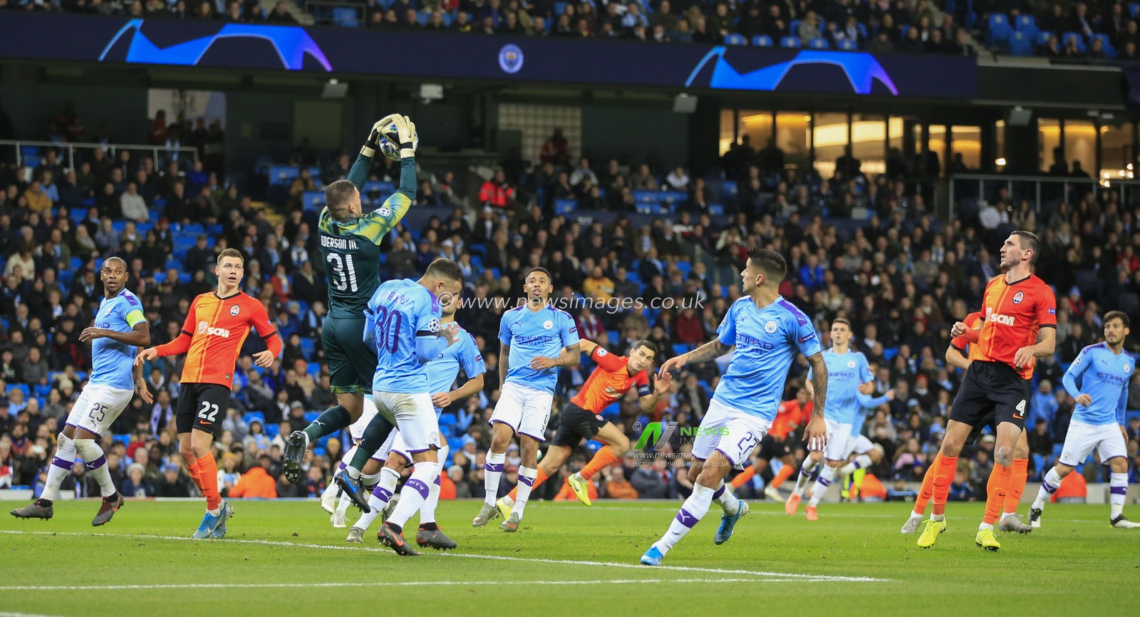 26th November 2019, Etihad Stadium, Manchester, England; UEFA Champions League, Manchester City v FC Shakhtar Donetsk : Ederson (31) of Manchester City makes a save in the dying minutes of the game

Credit: Conor Molloy/News Images
