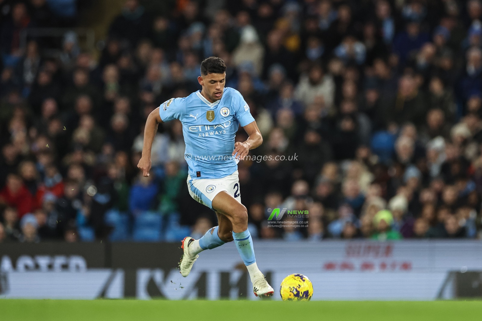 Matheus Nunes of Manchester City breaks with the ball during the Premier League match Manchester City vs Burnley at Etihad Stadium, Manchester, United Kingdom, 31st January 2024

(Photo by Mark Cosgrove/News Images)