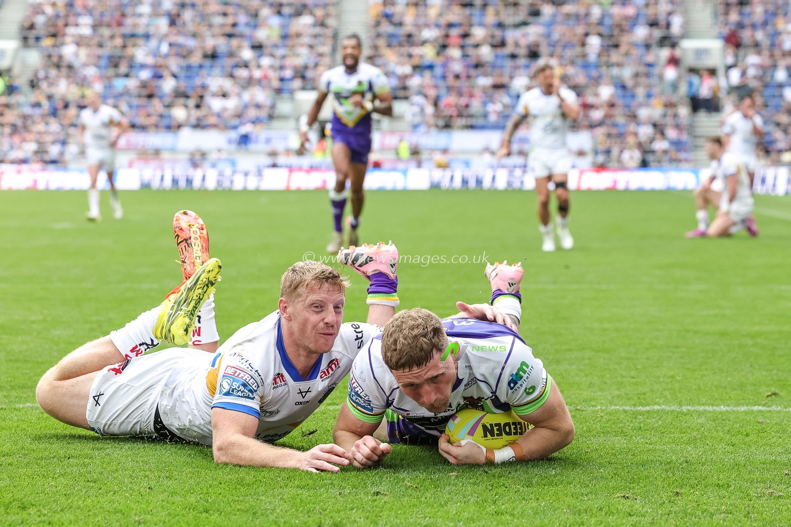 Ethan Ryan of Bradford Bulls goes over for his second try during the Betfred Super League Magic Weekend match Leeds Rhinos vs Bradford Bulls at Hill Dickinson Stadium, Liverpool, United Kingdom on 05 July 2026

(Photo by Mark Cosgrove/News Images)