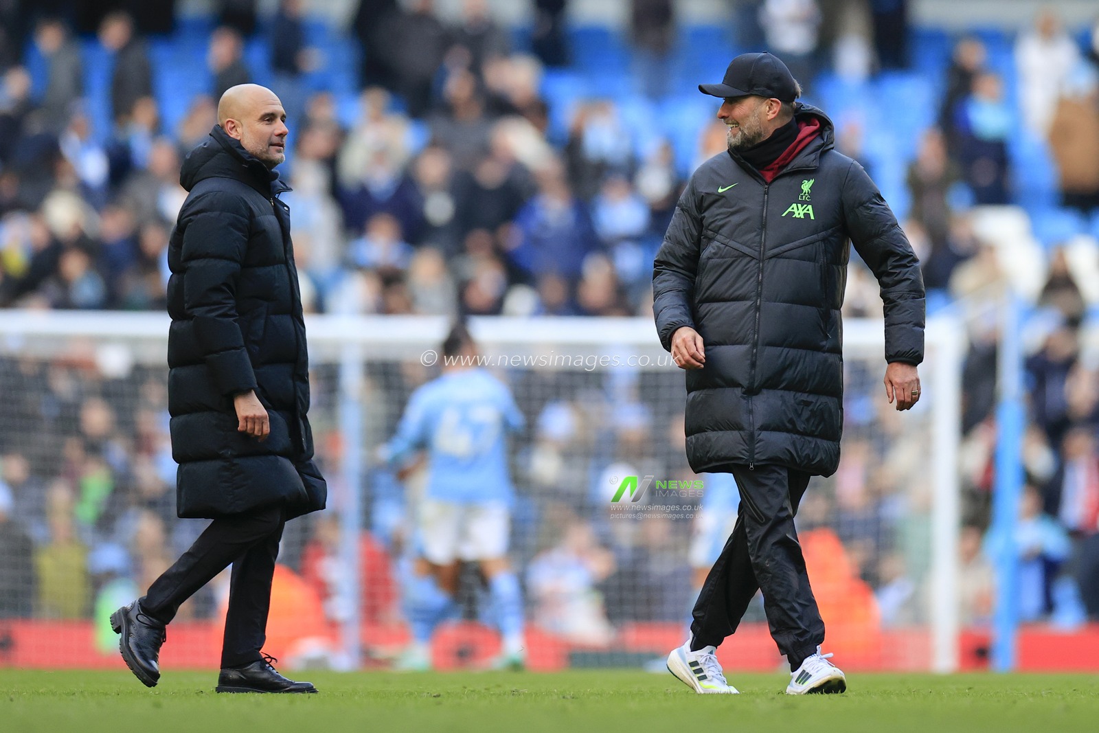 Liverpool manager Jurgen Klopp and Pep Guardiola the Manchester City manager at the end of the Premier League match Manchester City vs Liverpool at Etihad Stadium, Manchester, United Kingdom, 25th November 2023

(Photo by Conor Molloy/News Images)