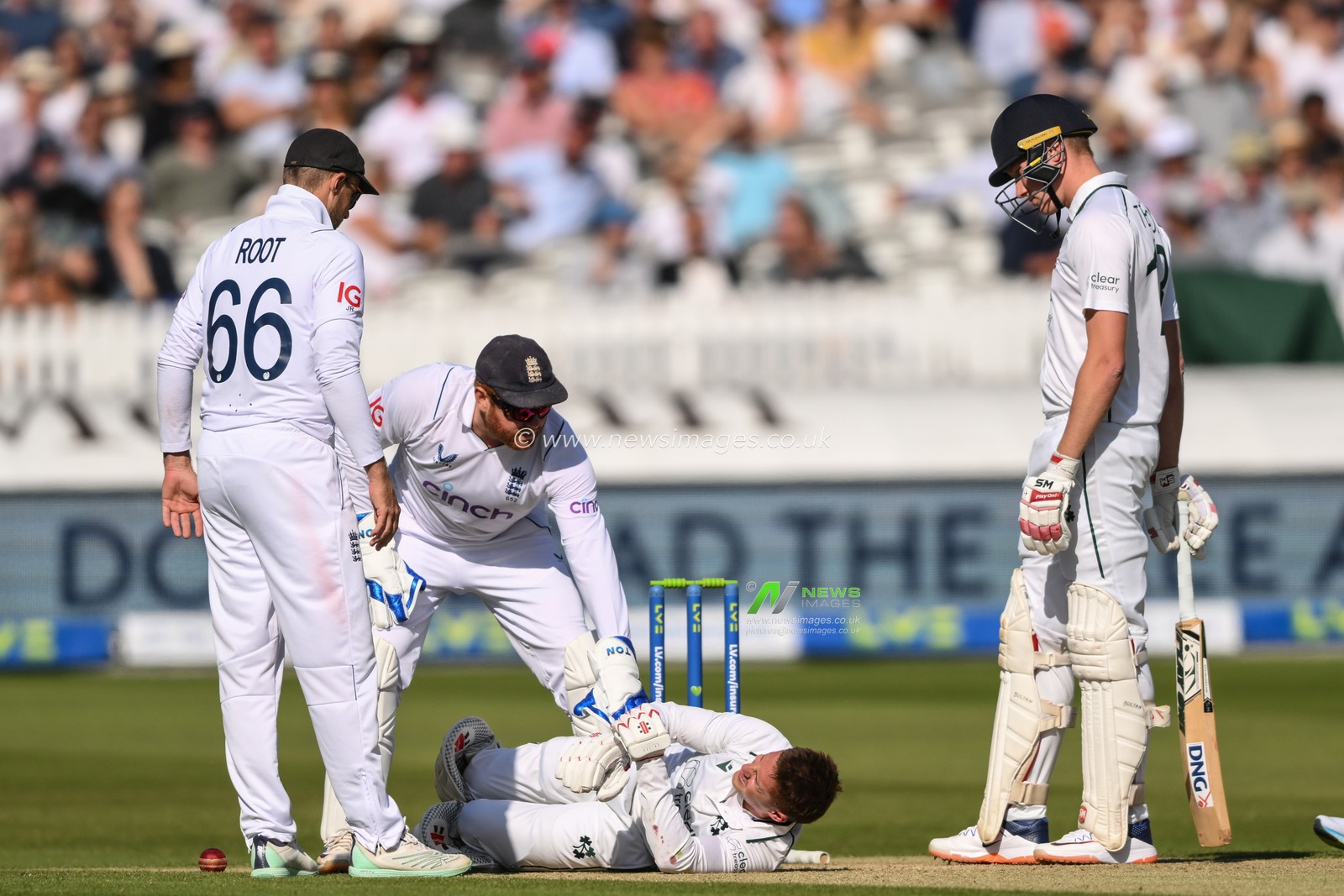 Jonny Bairstow of England shouts for medical assistance as James McCollum of Ireland  writhes in agony on the floor during the LV= Insurance Test match Day 2 England vs Ireland at Lords, London, United Kingdom, 2nd June 2023

(Photo by Craig Thomas/News Images)