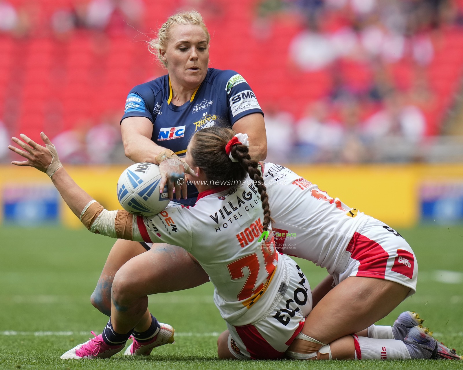 Phoebe Hook #28 of St. Helens tackles Amy Hardcastle #11 of Leeds Rhinos during the Betfred Challenge Cup match Hull KR vs Leigh Leopards at Wembley Stadium, London, United Kingdom, 12th August 2023

(Photo by Steve Flynn/News Images)