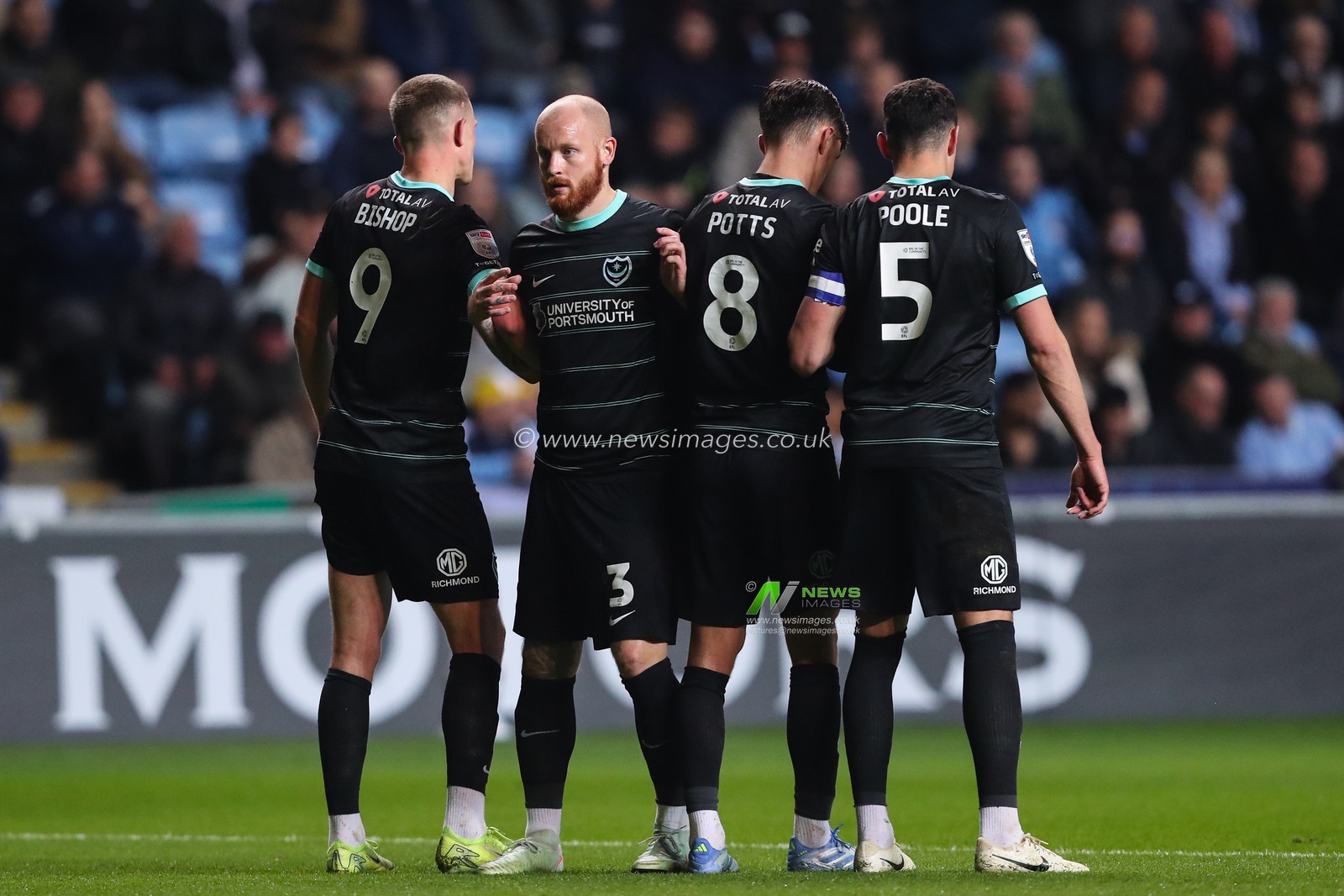 Connor Ogilvie of Portsmouth organises his players to defend a free kick during the Sky Bet Championship match Coventry City vs Portsmouth at Coventry Building Society Arena, Coventry, United Kingdom, 9th April 2025

(Photo by Gareth Evans/News Images)