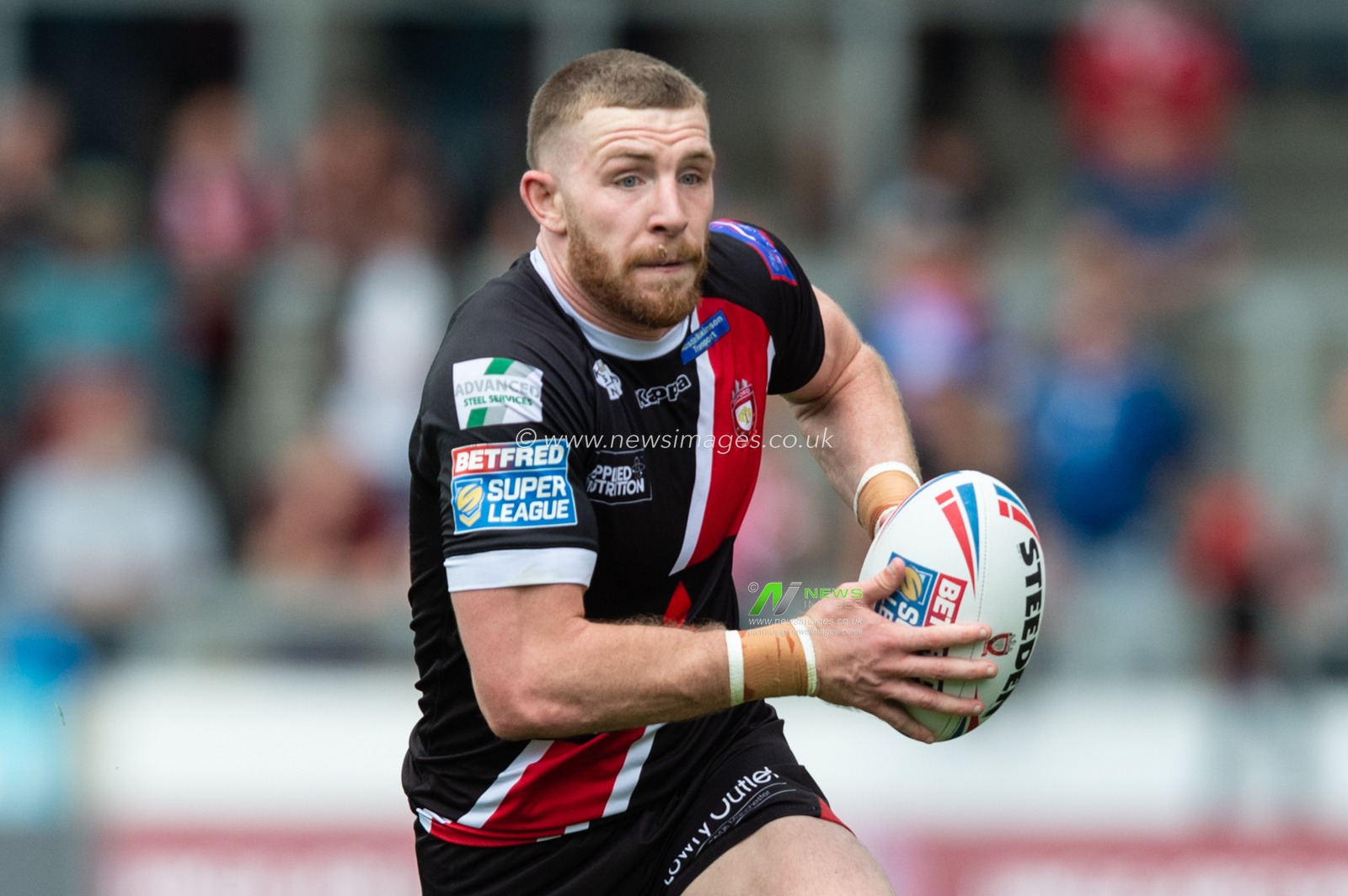 21st July 2019 ,  AJ Bell Stadium, Salford, England;  Betfred Super League, Round 23, Salford Red Devils vs Catalans Dragons ; Jackson Hastings of Salford Red Devils in possession during the game

Credit: Richard Long/News Images