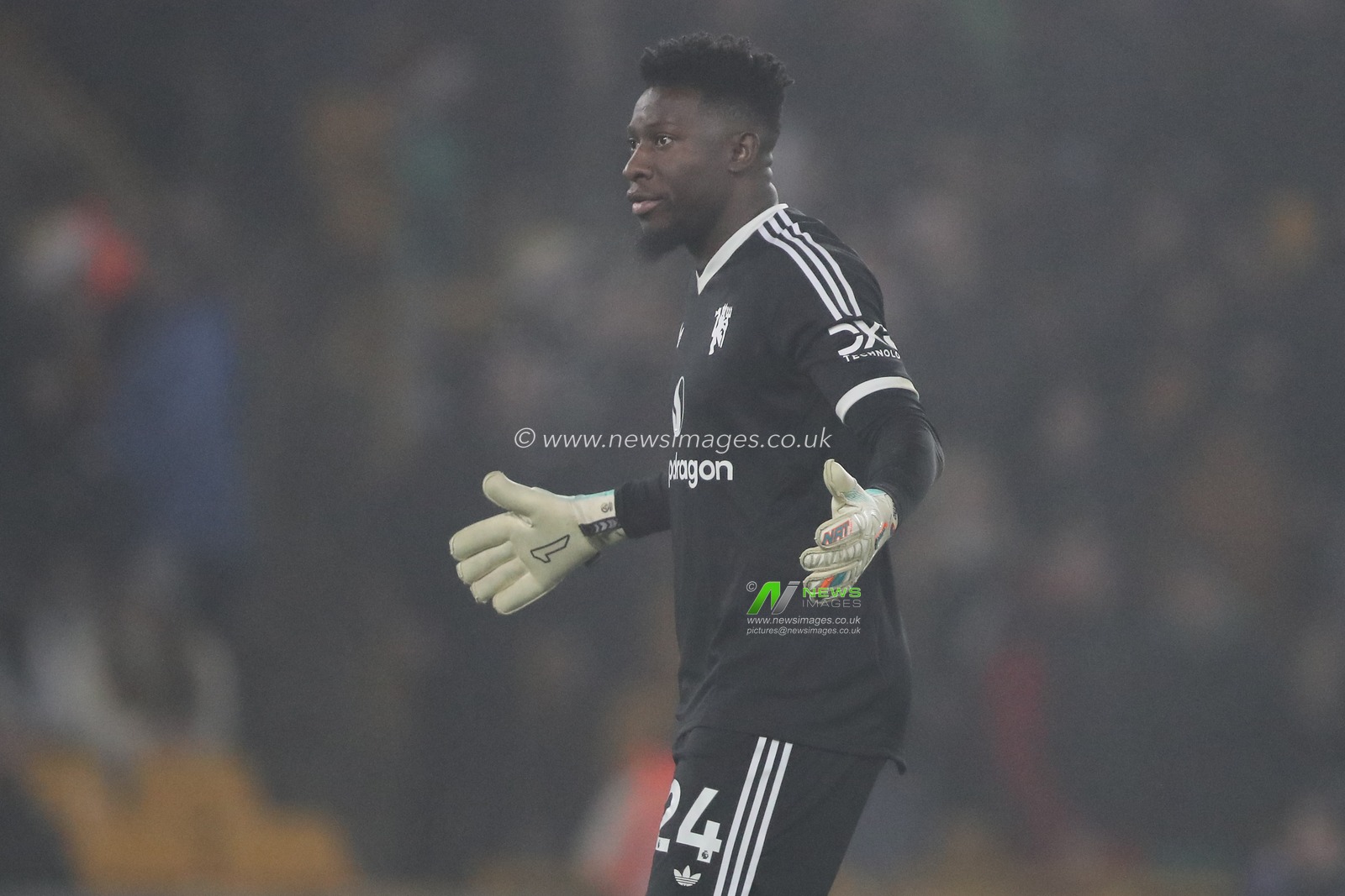 AndrÃ© Onana of Manchester United reacts to Bruno Fernandes of Manchester United being sent off during the Premier League match Wolverhampton Wanderers vs Manchester United at Molineux, Wolverhampton, United Kingdom, 26th December 2024

(Photo by Gareth Evans/News Images)