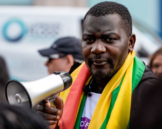 Former political detainee and youth activist Makomborero Haruzvishe speaks during Zimbabweans protest against the proposed constitution amendment at Embassy of Zimbabwe, London, United Kingdom on 18 April 2026

(Photo by Maynard Manyowa/News Images)
