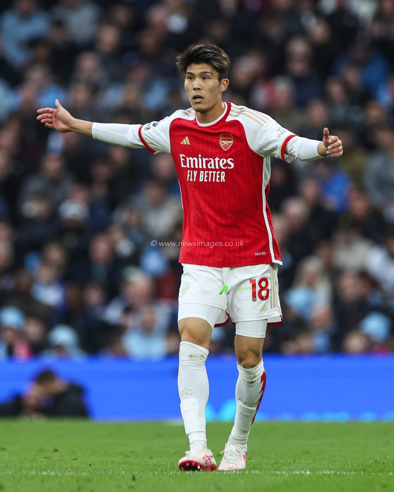 Takehiro Tomiyasu of Arsenal reacts during the Premier League match Manchester City vs Arsenal at Etihad Stadium, Manchester, United Kingdom, 31st March 2024

(Photo by Mark Cosgrove/News Images)