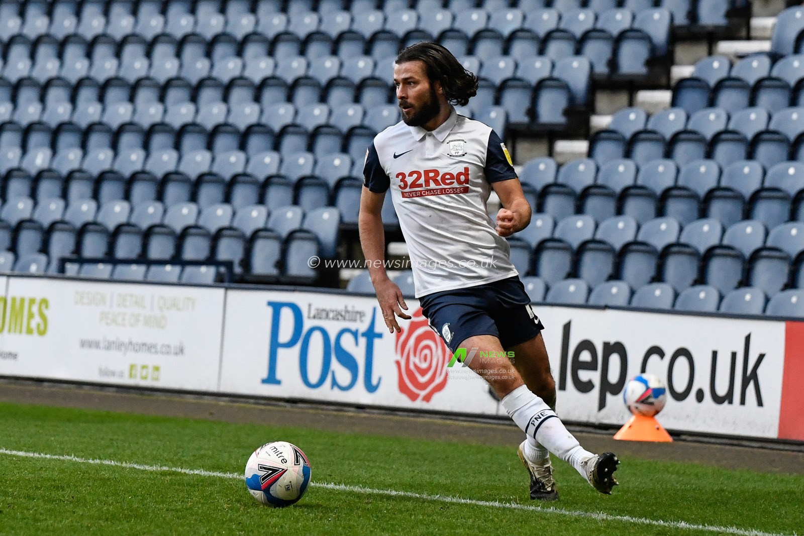 Joe Rafferty #15 of Preston North End with the ball on the wing