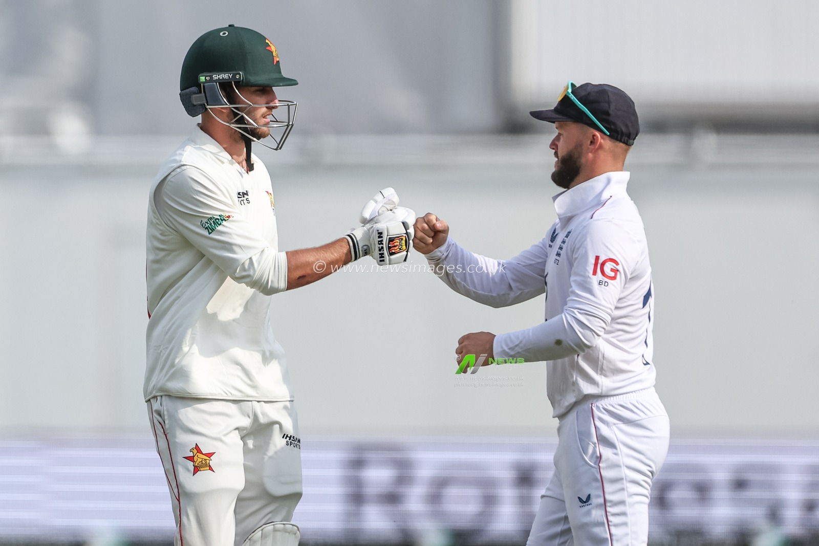 Ben Duckett of England fist bumps Brian Bennett of Zimbabwe after hes dismissed during the Rothesay Test Match Day 2 England vs Zimbabwe at Trent Bridge, Nottingham, United Kingdom, 23rd May 2025

(Photo by Mark Cosgrove/News Images)