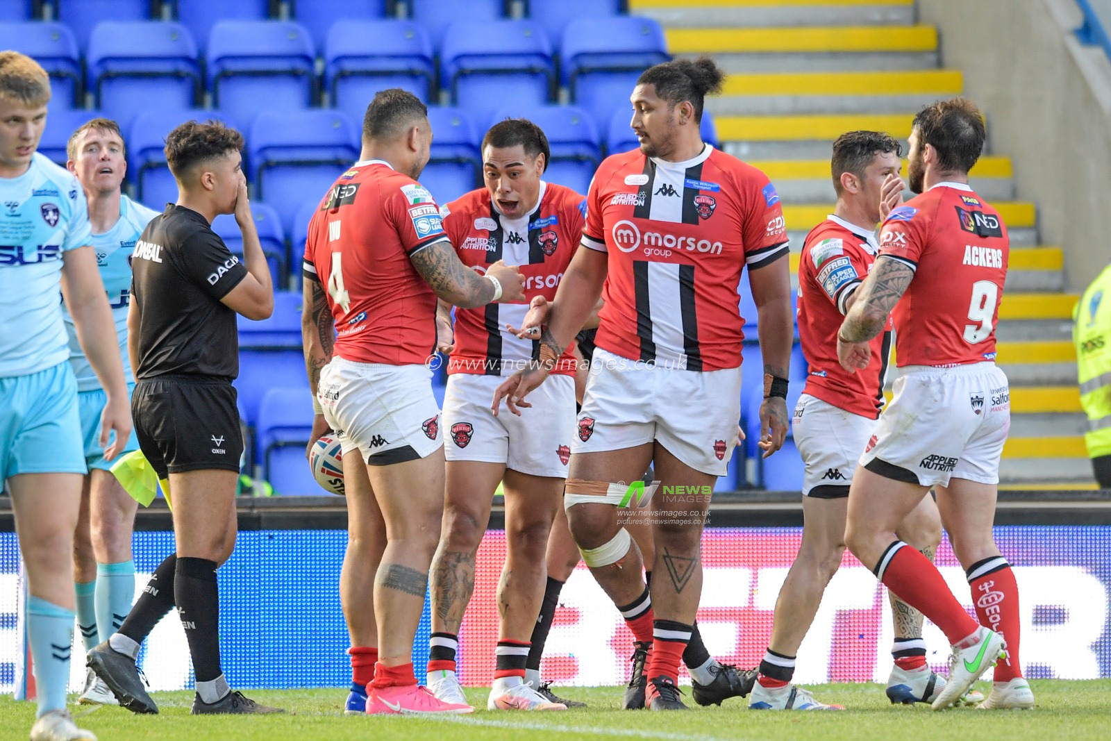 Krisnan Inu (4) of Salford Red Devils celebrates scoring a try to make it 16-14
