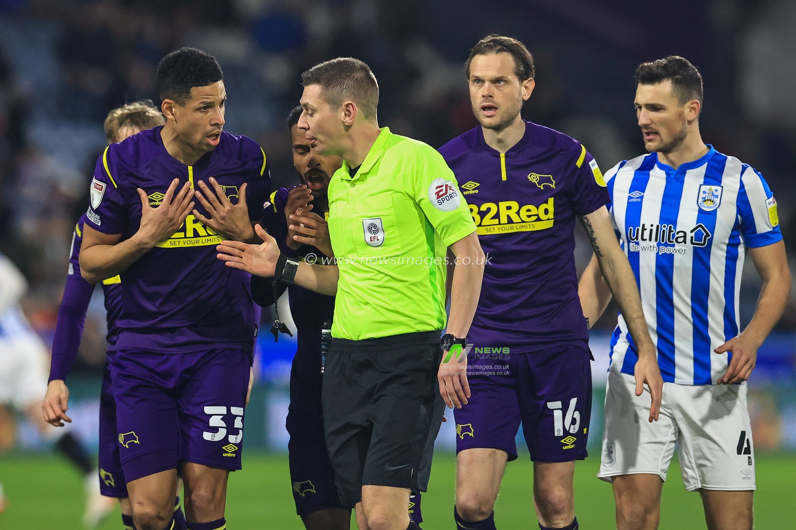 Curtis Davies #33 of Derby County appeals to Referee Matthew Donohue  about his sides red card