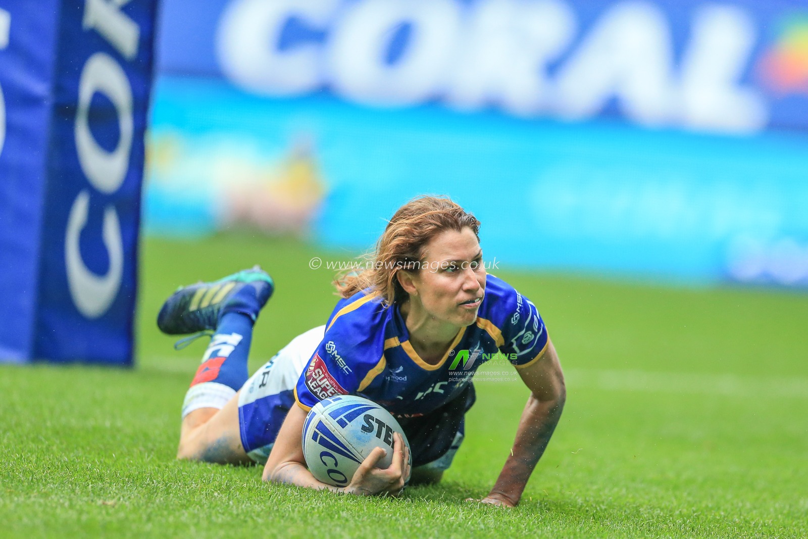 27th July 2019 , University of Bolton Stadium, Bolton, England; 2019 Coral Womenâ€™s Challenge Cup Final , Castleford Tigers Women vs Leeds Rhinos Women ; Courtney Hill (7) of Leeds Rhinos Women goes over for a try 


Credit: Mark Cosgrove/News Images