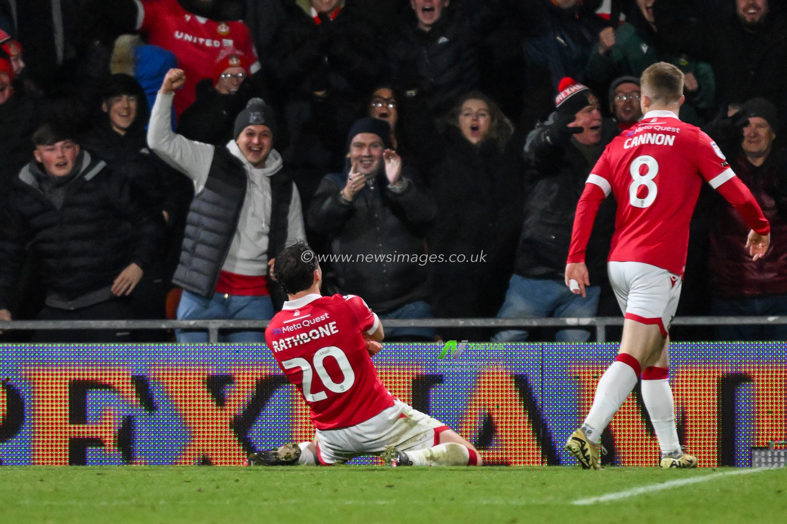 Ollie Rathbone of Wrexham celebrates his goal to make it  1-0 during the Sky Bet League 1 match Wrexham vs Barnsley at SToK Cae Ras, Wrexham, United Kingdom, 3rd December 2024

(Photo by Craig Thomas/News Images)