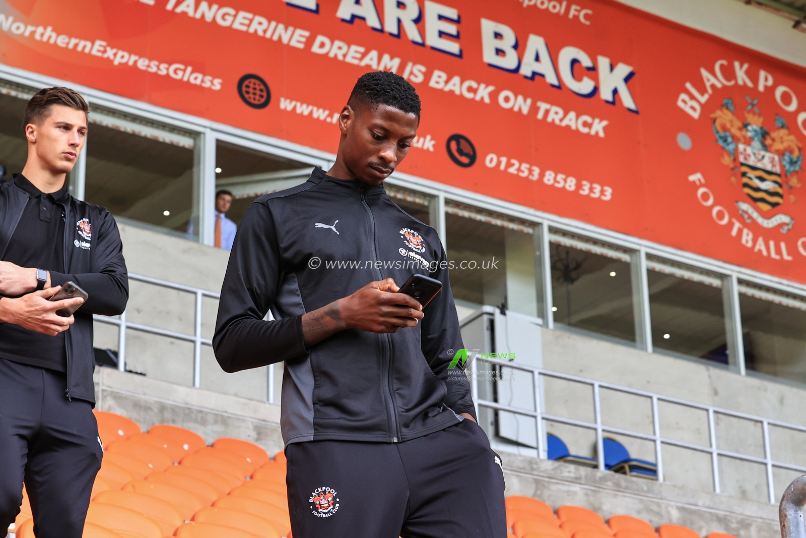 Marvin Ekpiteta #21 of Blackpool arrives at Bloomfield Road