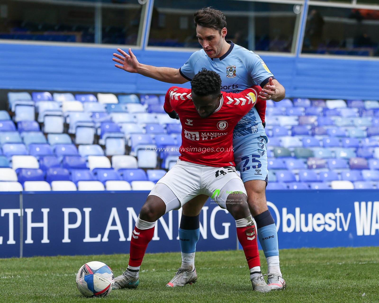 Steven Sessegnon #43 of Bristol City protects the ball from Matthew James #25 of Coventry City