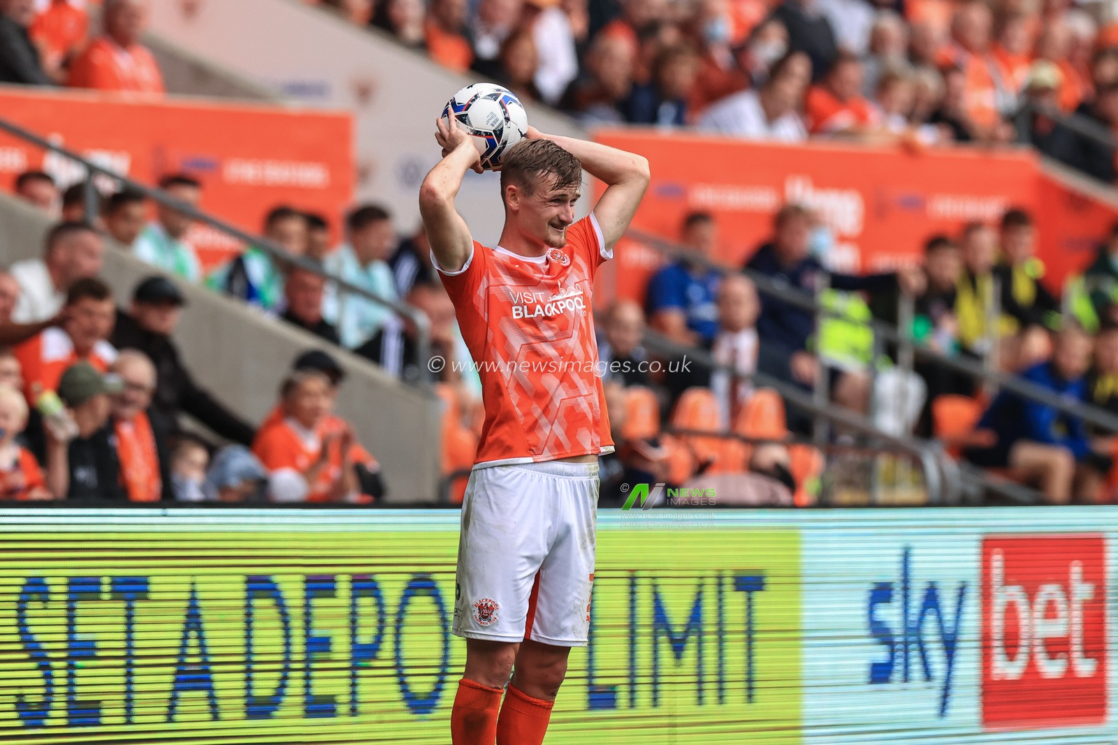 Callum Connolly #2 of Blackpool takes a throw-in