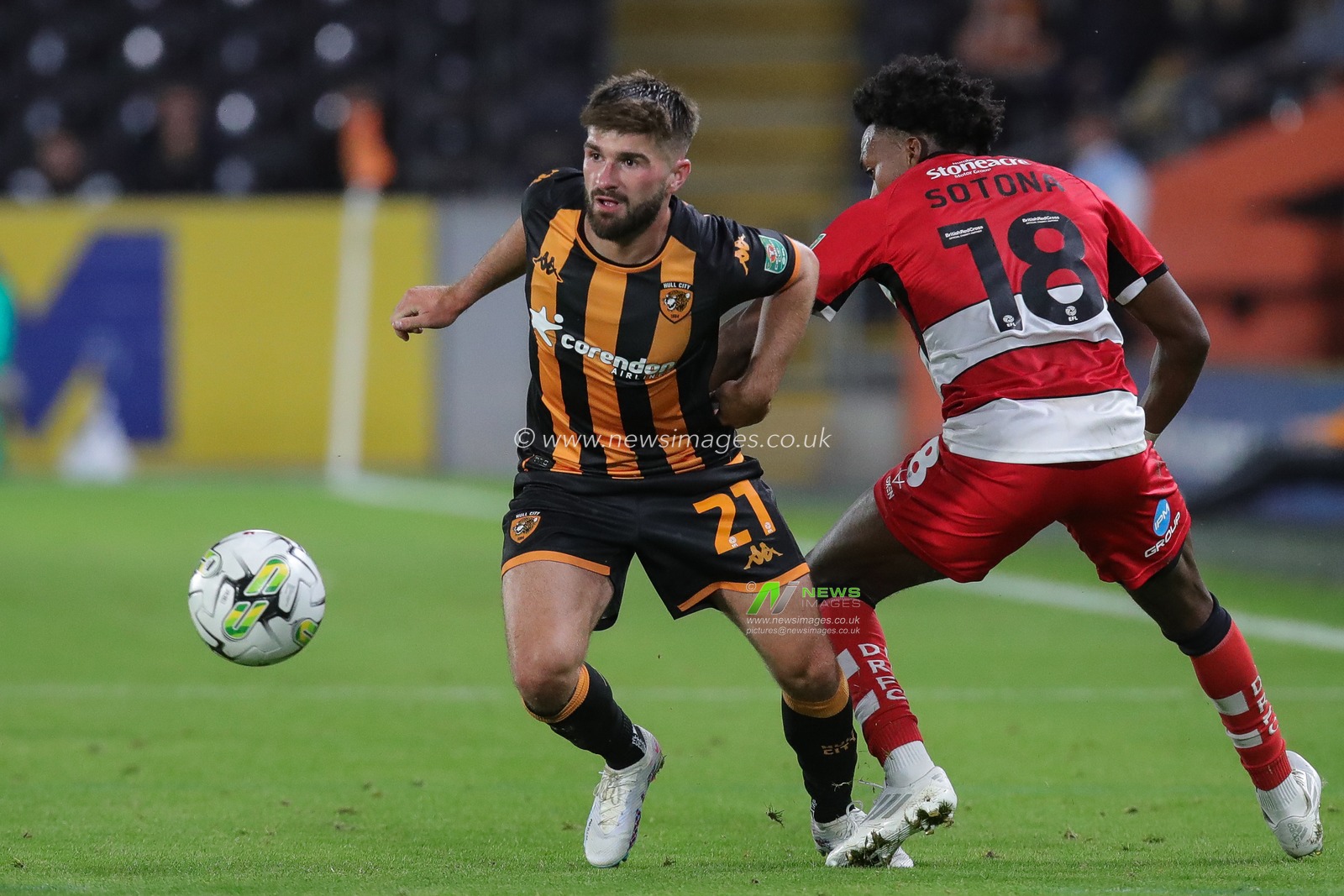 Brandon Fleming #21 of Hull City on the ball during the Carabao Cup match Hull City vs Doncaster Rovers at MKM Stadium, Hull, United Kingdom, 8th August 2023

(Photo by James Heaton/News Images)