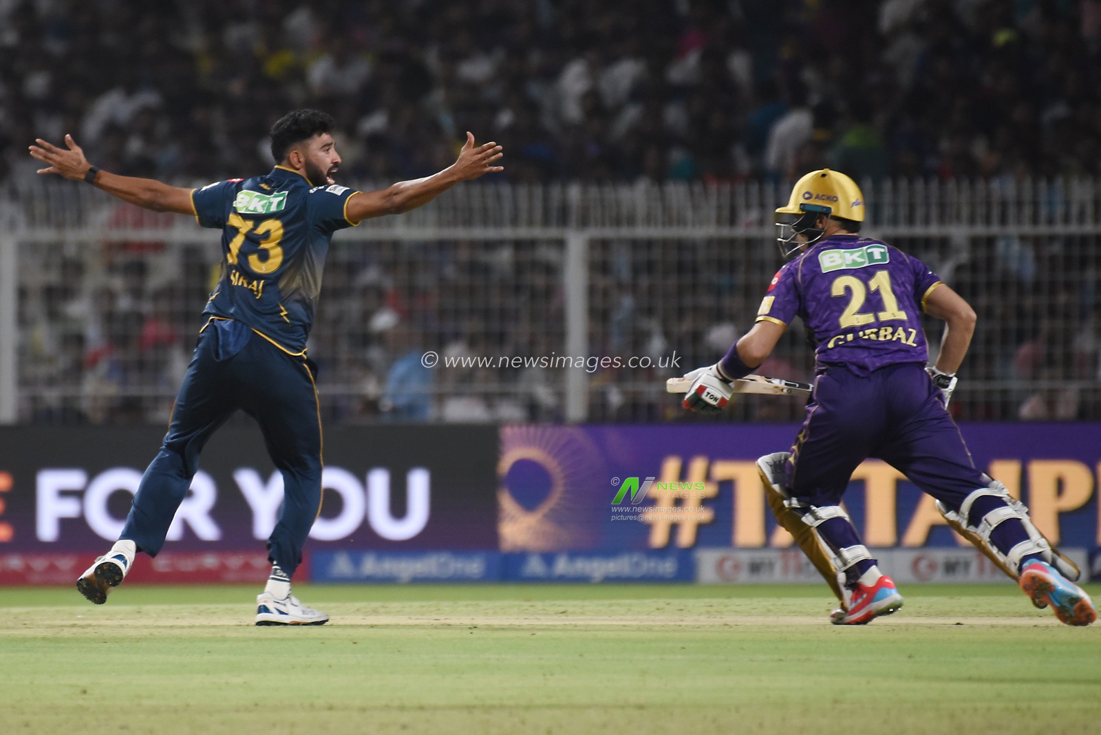 Gujarat Titans' Mohammed Siraj,left, celebrates the dismissal of Kolkata Knight Riders' Rahamanullah Gurbaz during the Indian Premier League (IPL) Twenty20 cricket match between Kolkata Knight Riders and Gujarat Titans at the Eden Gardens in Kolkata on April 21, 2025.Photo by Debajyoti Chakraborty(Photo: Debajyoti Chakraborty/News Images)