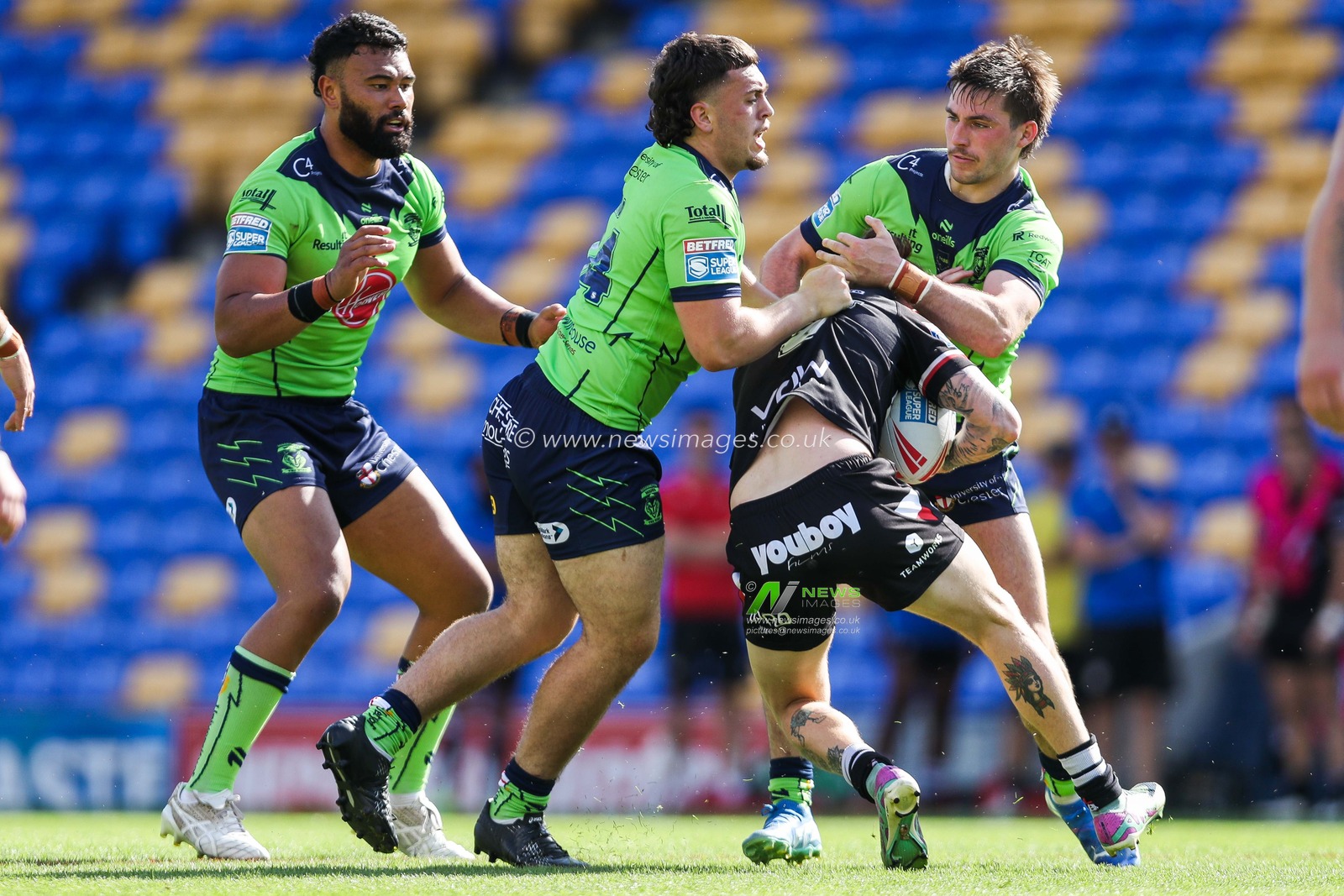 Max Wood of Warrington Wolves makes a tackle during the Betfred Super League Round 21 match London Broncos vs Warrington Wolves at Plough Lane, Wimbledon, United Kingdom, 11th August 2024

(Photo by Izzy Poles/News Images)
